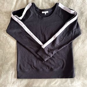 Sweater with shoulder cutouts